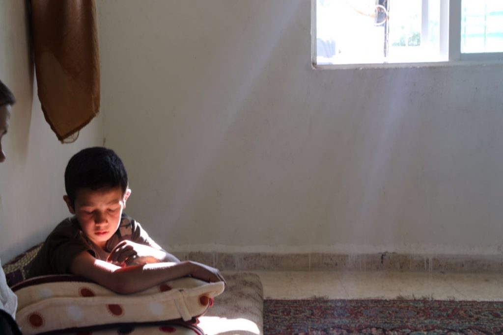 Sun streams into one of the homes shared by a group of Syrian refugees